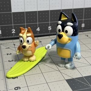 Bluey And Friends Posable Figures Lot Of 2 And A Surfboard Preowned Condition